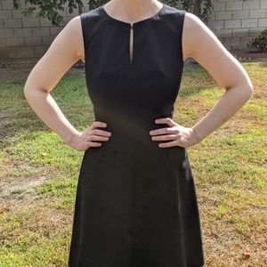 Black Calvin Klein dress with gold closure